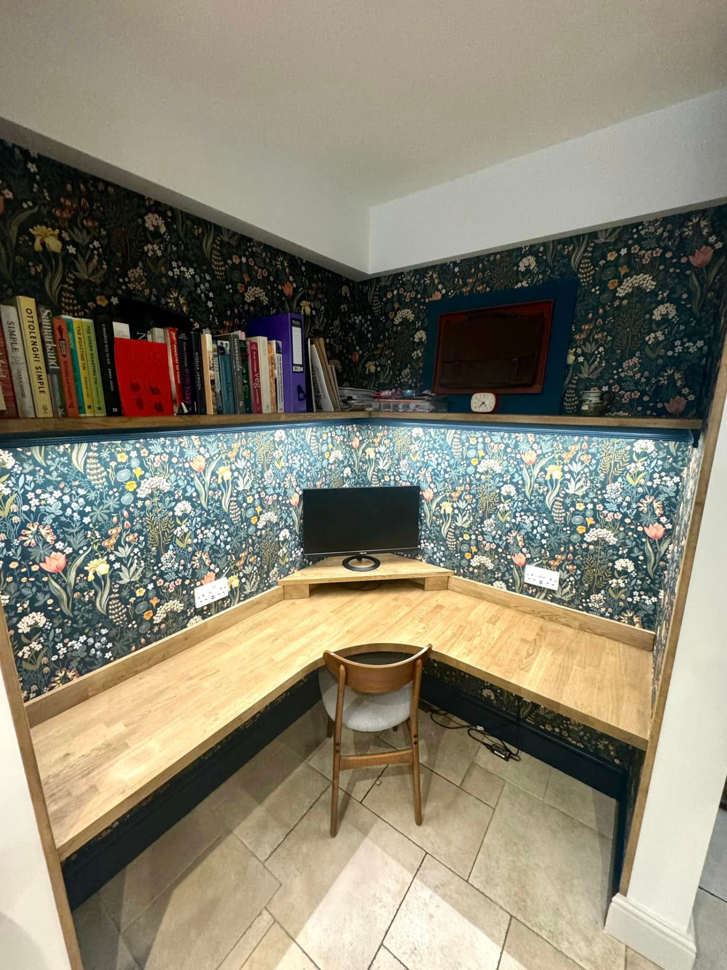 Fleet study nook papered in a dark botanical print with deep blue painted woodwork and oak desking